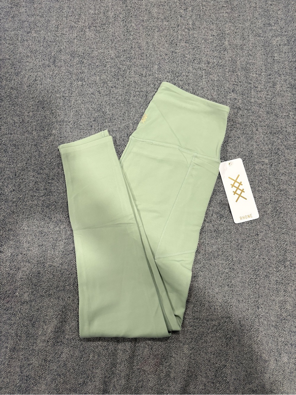 rhone revive 7/8 pocket legging | size m